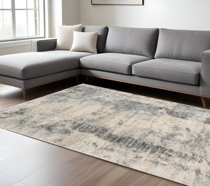 5' X 8' Ivory And Blue Abstract Area Rug