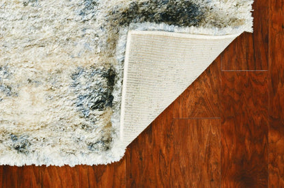 5' X 8' Ivory And Blue Abstract Area Rug