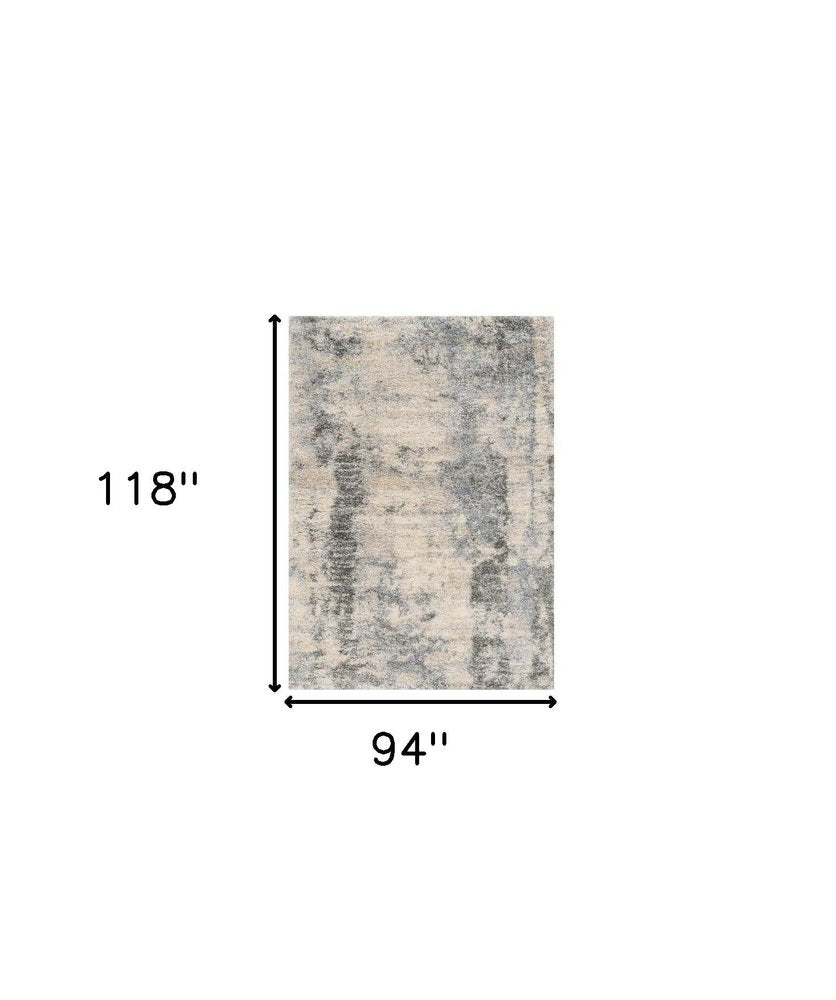 8' X 10' Ivory And Blue Abstract Area Rug