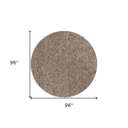 5' X 7' Beige And Brown Abstract Shag Hand Woven Area Rug