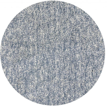 5' X 7' Slate Blue And Ivory Abstract Shag Hand Woven Area Rug