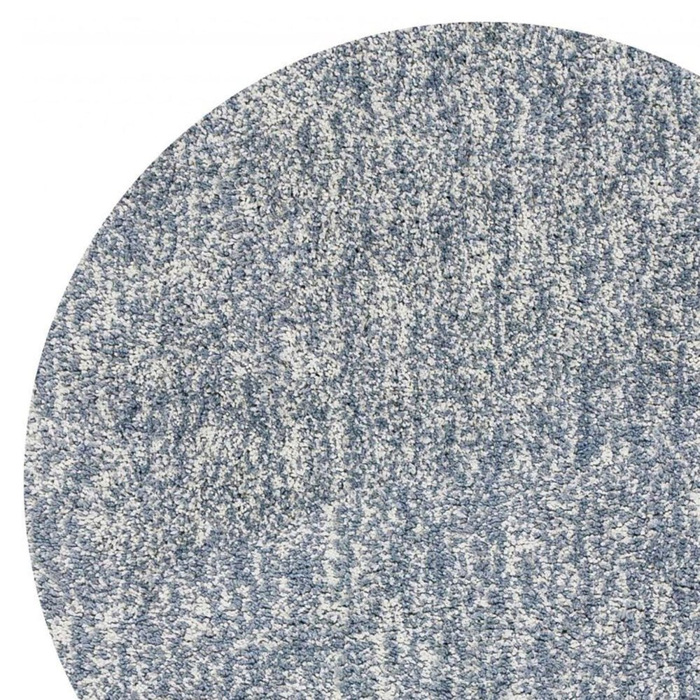 5' X 7' Slate Blue And Ivory Abstract Shag Hand Woven Area Rug