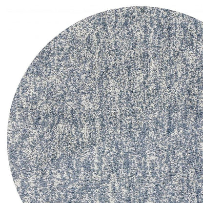 5' X 7' Slate Blue And Ivory Abstract Shag Hand Woven Area Rug