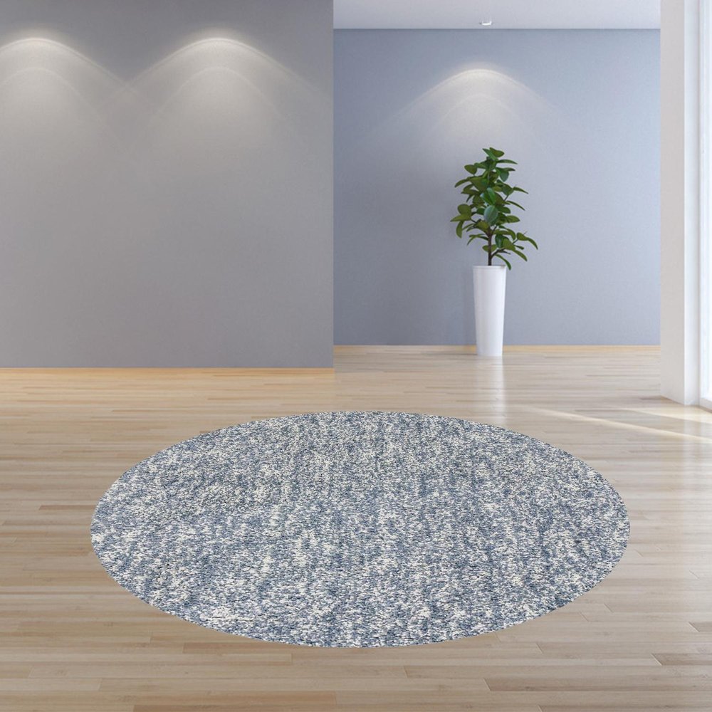 5' X 7' Slate Blue And Ivory Abstract Shag Hand Woven Area Rug