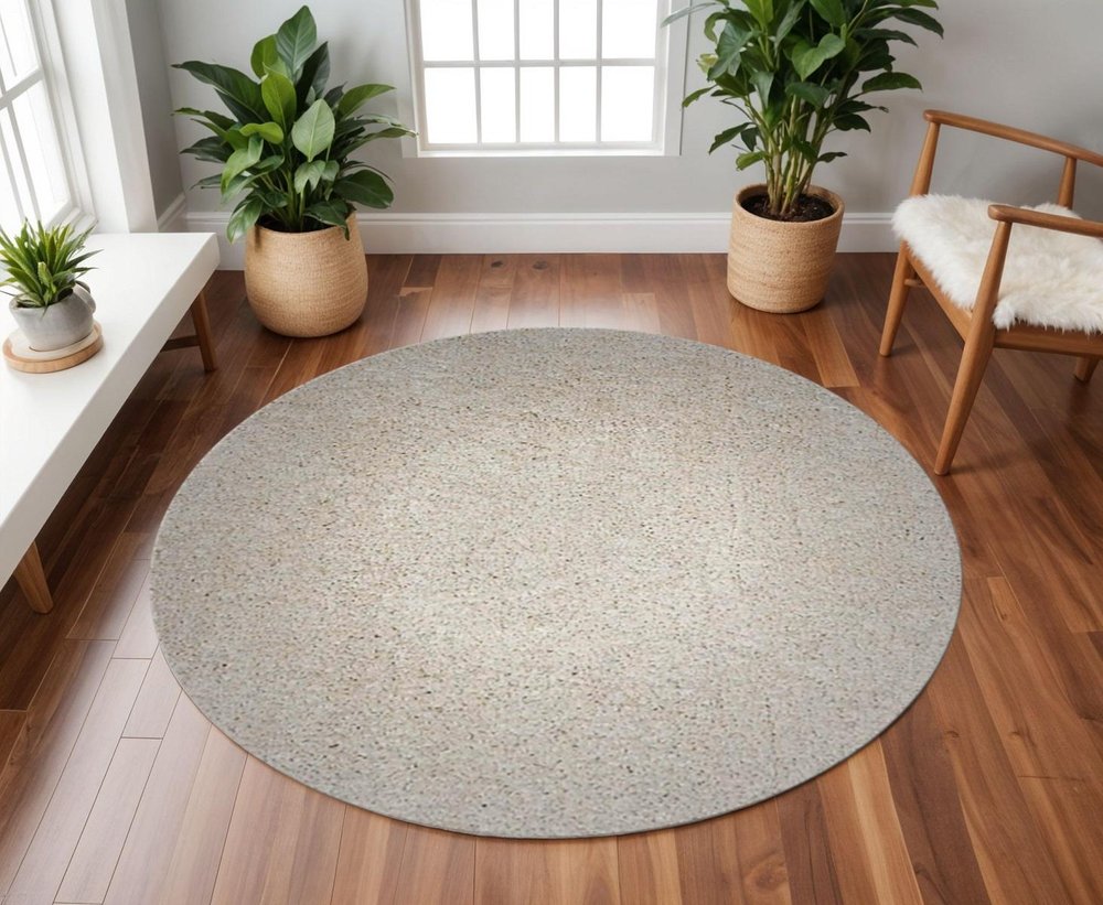 8' Ivory Hand Woven Round Rug