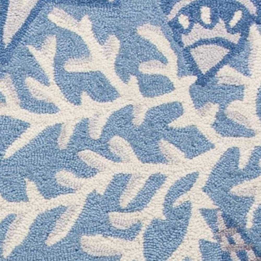 5' X 8' Blue Gray And White Fish and Coral Hand Tufted Area Rug