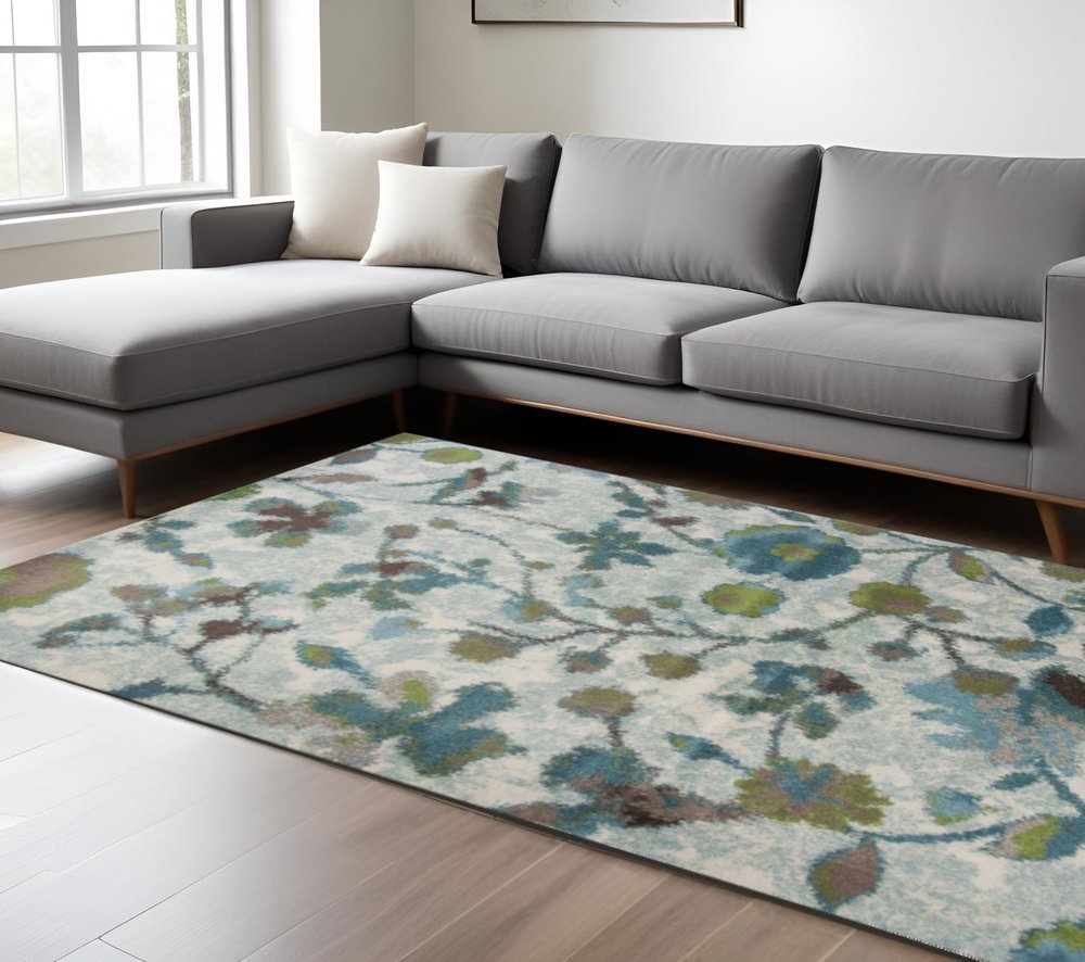 10' X 13' Teal Blue White And Green Floral Vines Area Rug