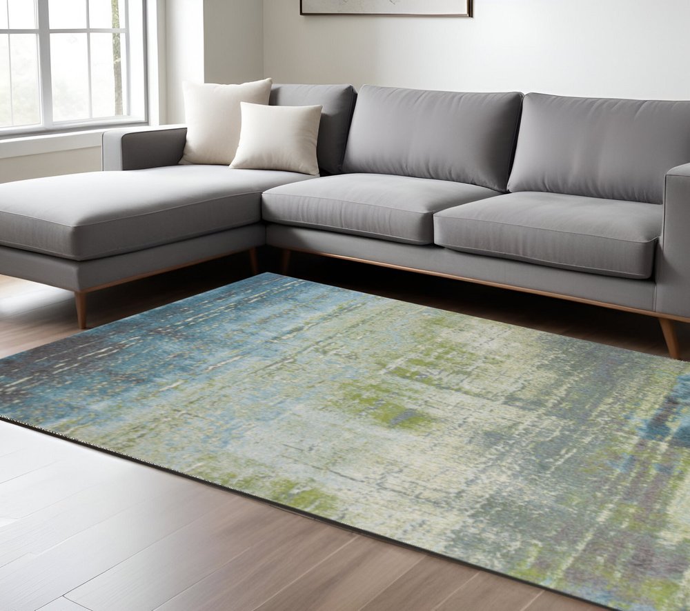 7' X 10' Blue And Green Abstract Area Rug
