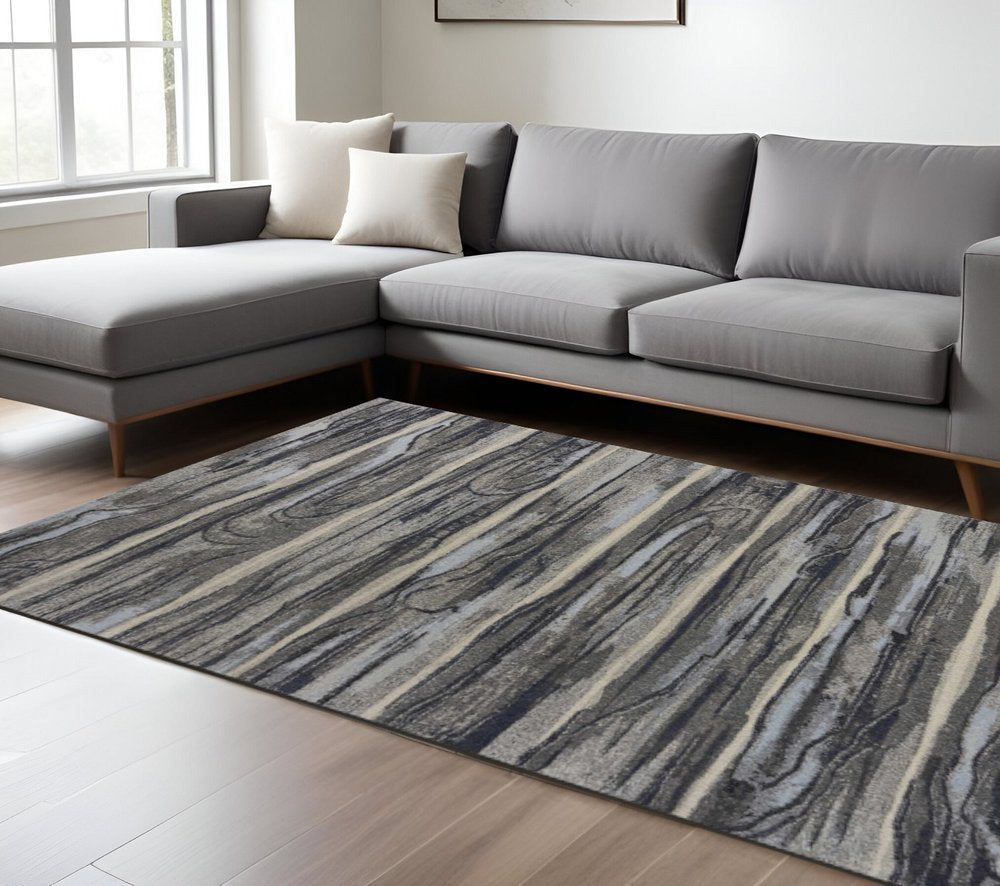 8' X 11' Gray Blue And Black Abstract Area Rug