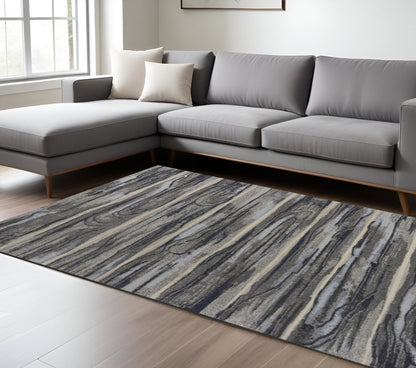 8' X 11' Gray Blue And Black Abstract Area Rug