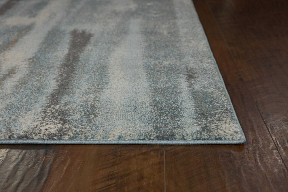 9' X 13' Teal Blue And White Abstract Area Rug