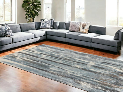 7' X 10' Teal Blue And White Abstract Distressed Area Rug