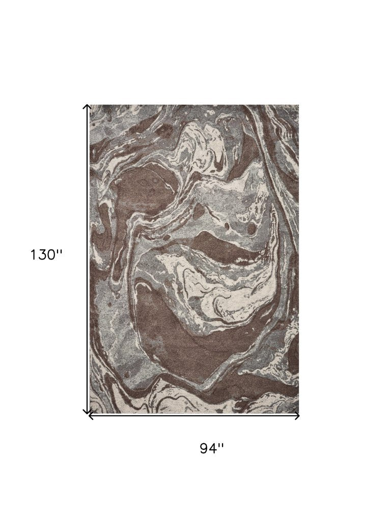 5' X 8' Brown And Ivory Abstract Area Rug