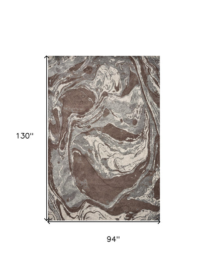 5' X 8' Brown And Ivory Abstract Area Rug