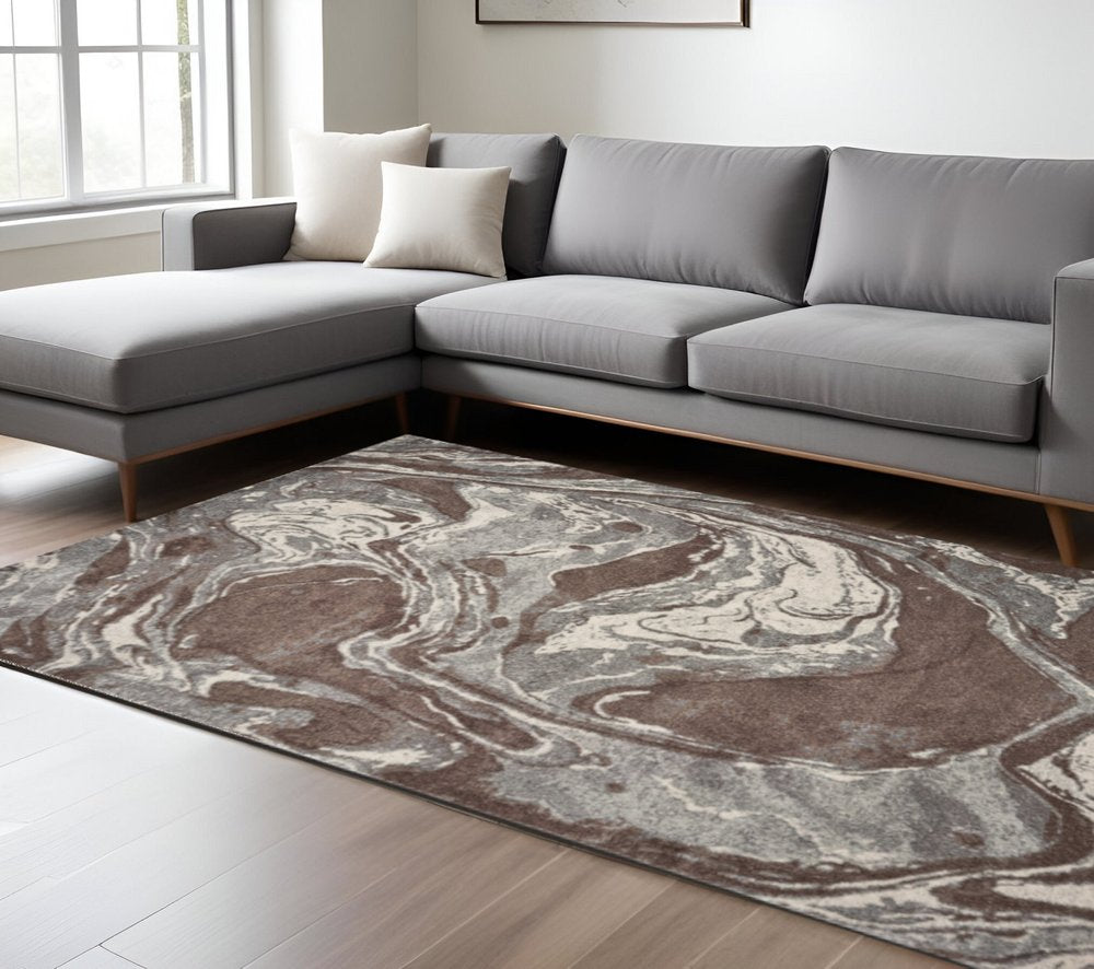 5' X 8' Brown And Ivory Abstract Area Rug