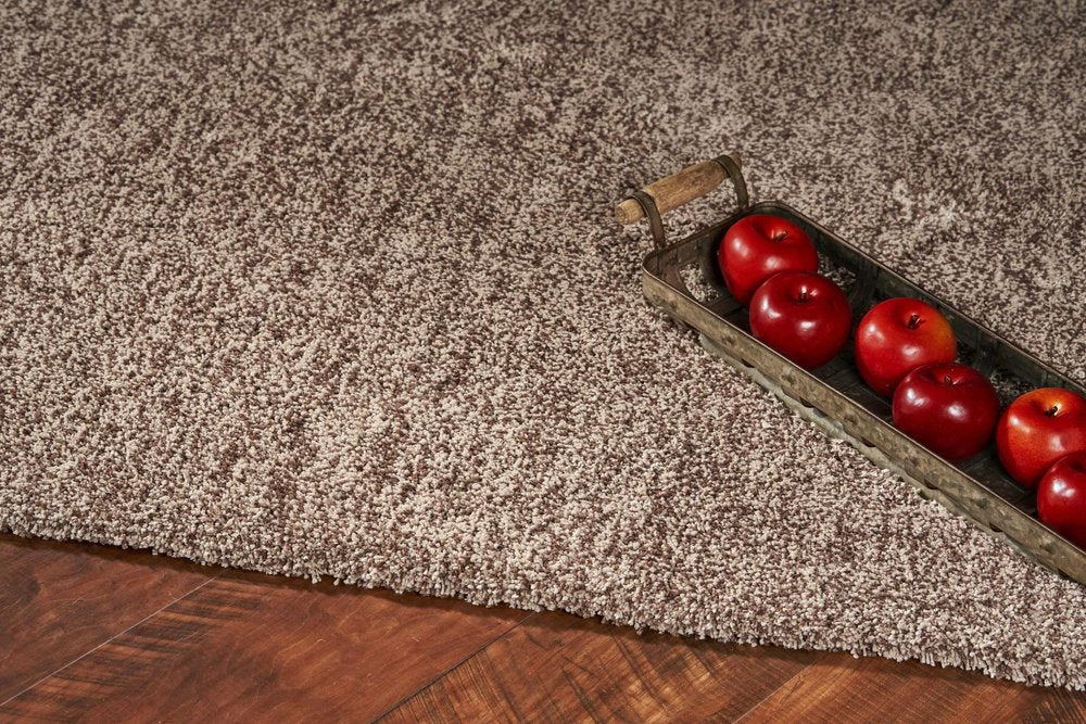 5' X 7' Beige And Brown Abstract Shag Hand Woven Area Rug