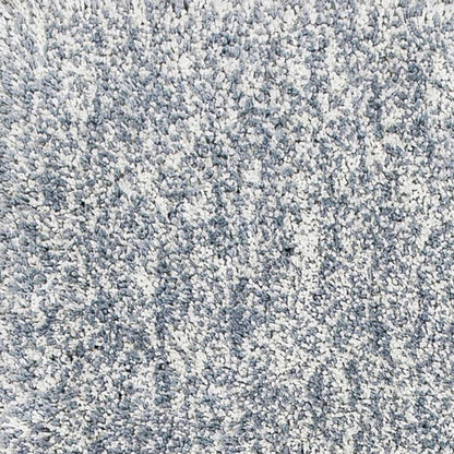 5' X 7' Slate Blue And Ivory Abstract Shag Hand Woven Area Rug