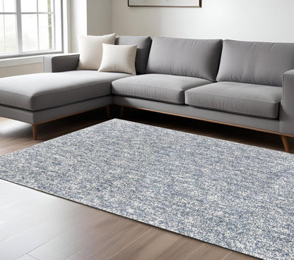 5' X 7' Slate Blue And Ivory Abstract Shag Hand Woven Area Rug