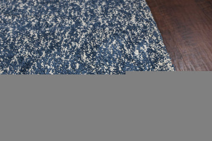 5' X 7' Indigo And Ivory Abstract Hand Woven Area Rug