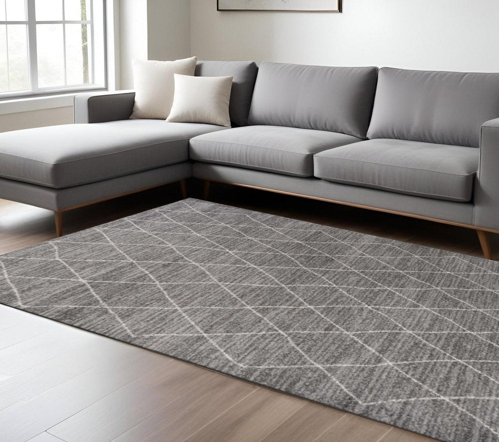 5' X 8' Gray And Ivory Geometric Area Rug