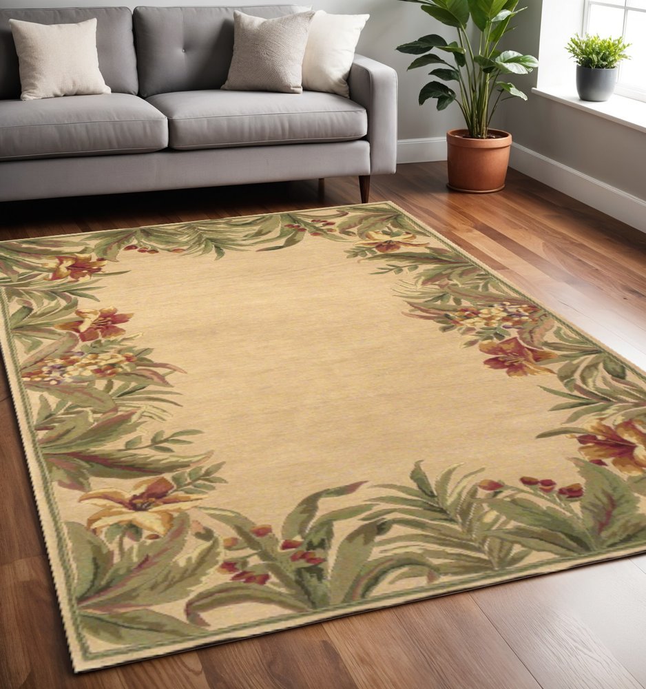 5' X 8' Beige Red And Green Wool Tropical Floral Hand Tufted Area Rug