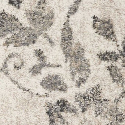 5' X 8' Gray And Tan Floral Distressed Area Rug