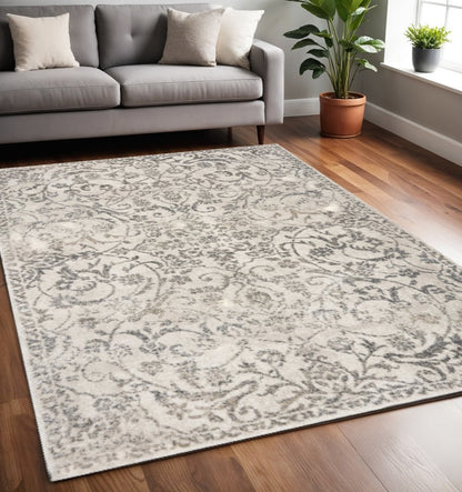 5' X 8' Ivory And Brown Floral Medallion Area Rug