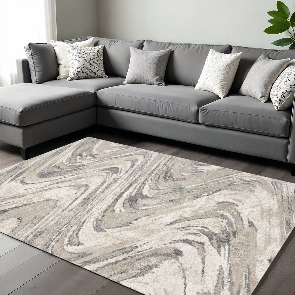 7' X 9' Gray And Tan Abstract Area Rug