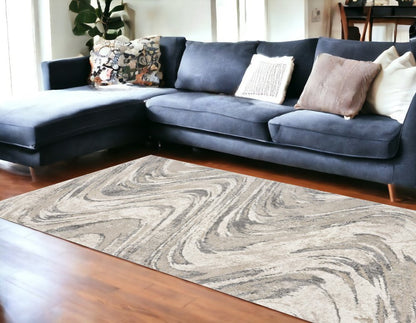 9' X 13' Gray And Tan Abstract Area Rug