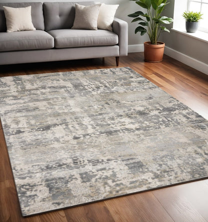 7' X 9' Gray And Tan Abstract Area Rug