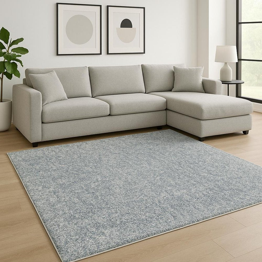 8' Slate Blue And Ivory Abstract Hand Woven Round Rug