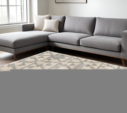 5' X 8' Ivory And Gray Geometric Area Rug