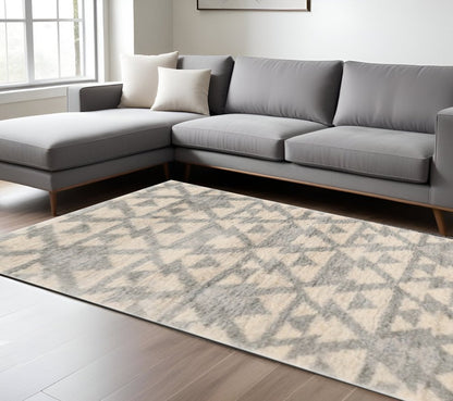 5' X 8' Ivory And Gray Geometric Area Rug