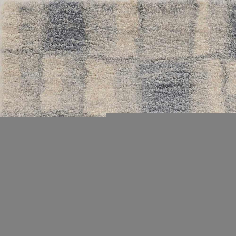 5' X 8' Ivory And Blue Abstract Area Rug