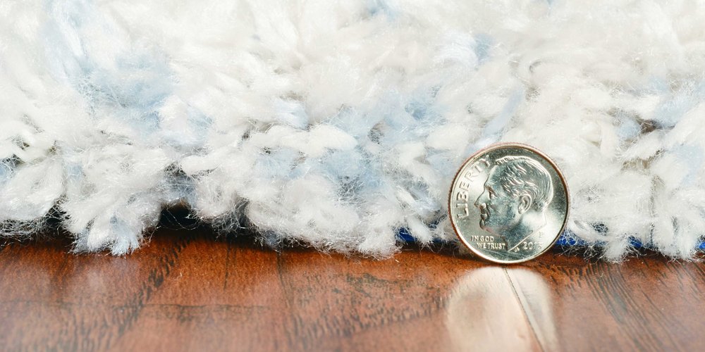 9' X 13' Ivory And Blue Abstract Geometric Area Rug