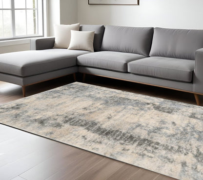 8' X 10' Ivory And Blue Abstract Area Rug