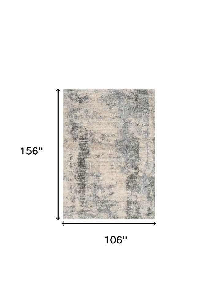 8' X 10' Ivory And Blue Abstract Area Rug