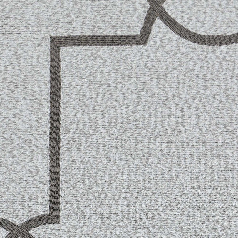 5' X 7' Ivory And Brown Geometric Handmade Indoor Outdoor Area Rug