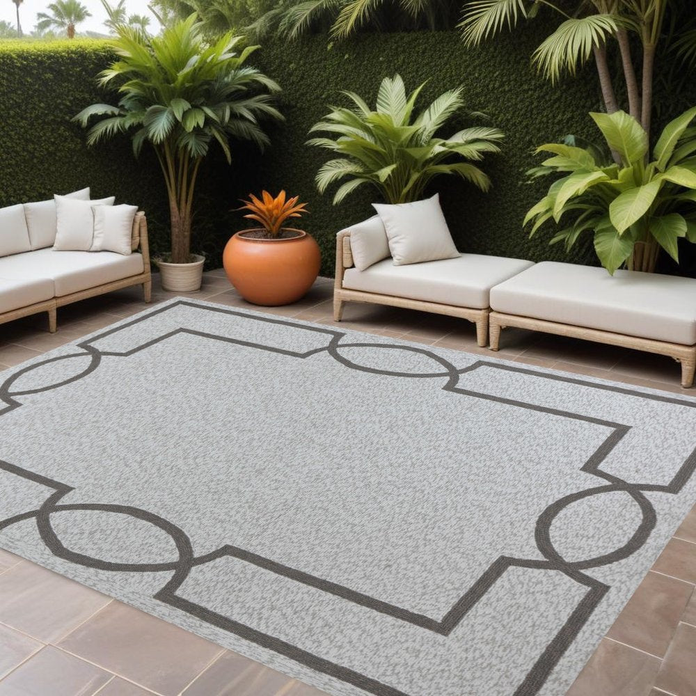 5' X 7' Ivory And Brown Geometric Handmade Indoor Outdoor Area Rug