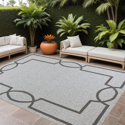 5' X 7' Ivory And Brown Geometric Handmade Indoor Outdoor Area Rug