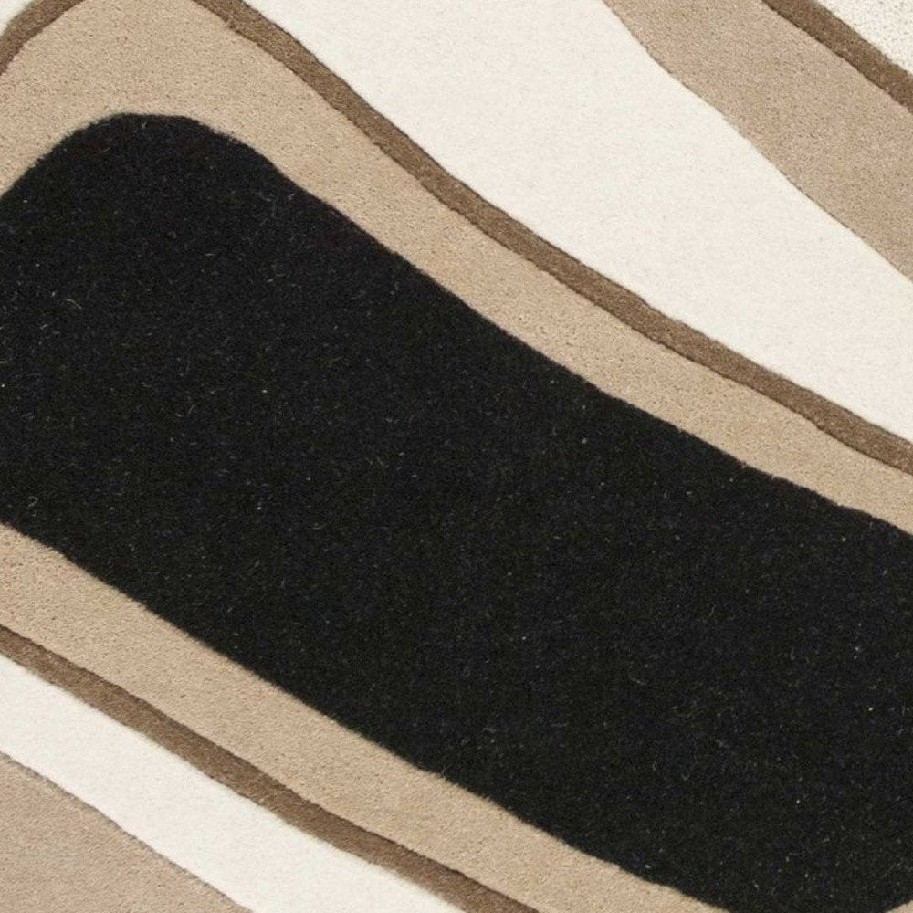 5' X 8' Beige Ivory And Black Wool Abstract Hand Tufted Area Rug