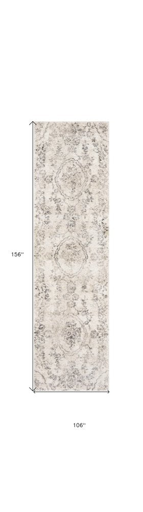 5' X 8' Gray And Tan Floral Distressed Area Rug