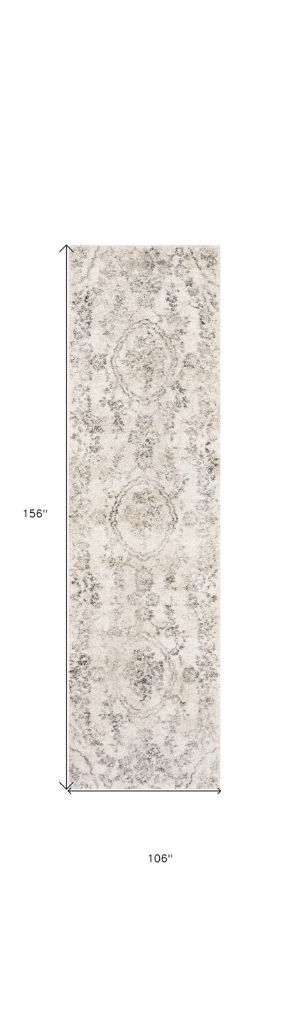 8' X 10' Gray And Tan Floral Distressed Area Rug