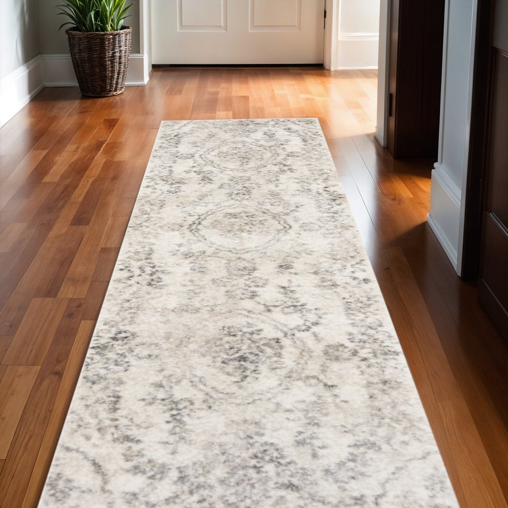 8' X 10' Gray And Tan Floral Distressed Area Rug