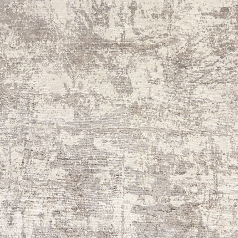8' X 11' Beige And Ivory Abstract Hand Loomed Area Rug