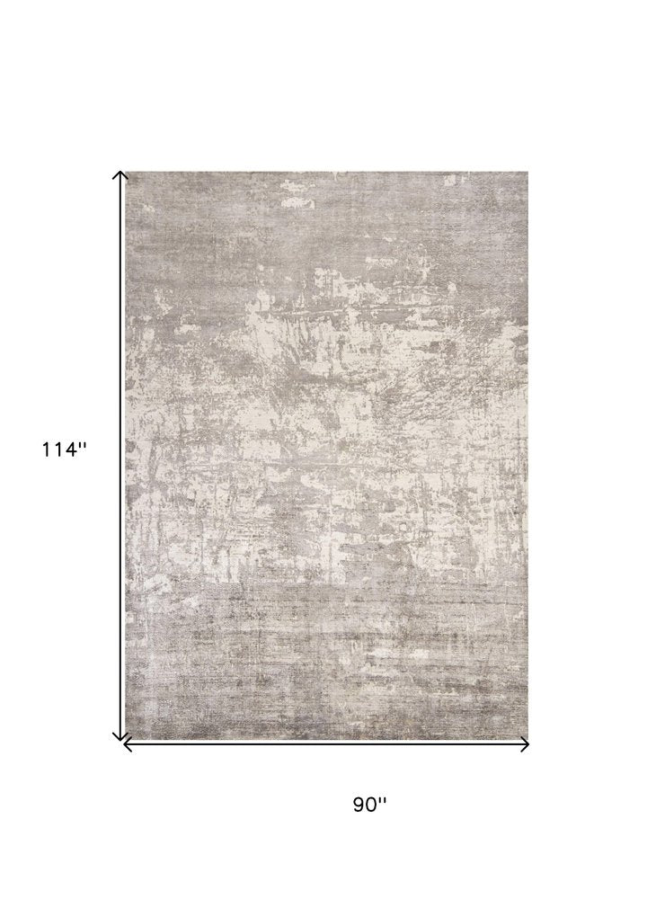 9' X 13' Beige And Ivory Abstract Hand Loomed Area Rug