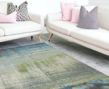 5' X 8' Blue And Green Abstract Area Rug
