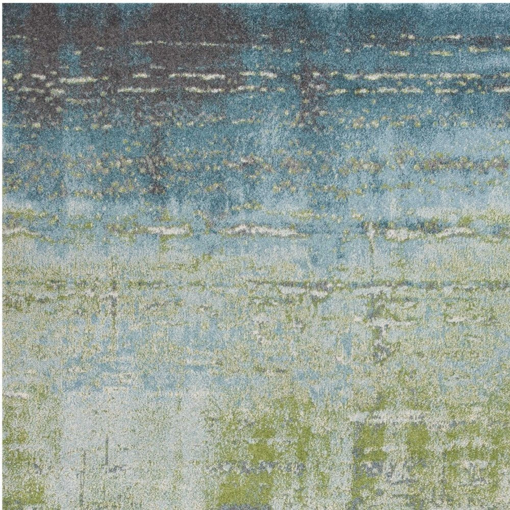 5' X 8' Blue And Green Abstract Area Rug