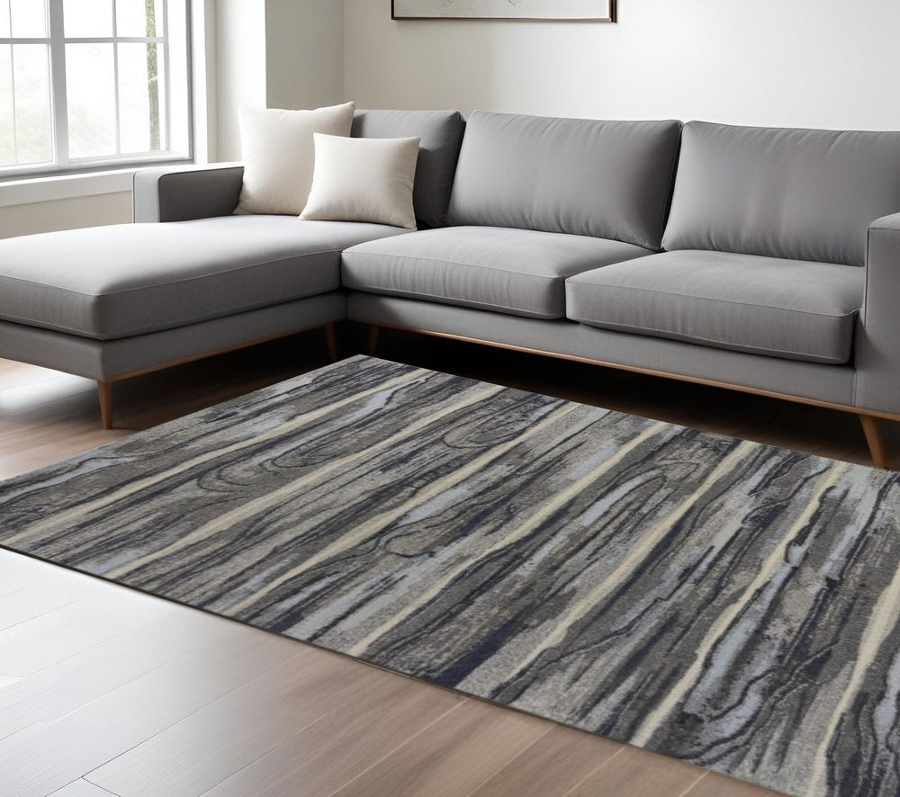 8' X 11' Gray Blue And Black Abstract Area Rug