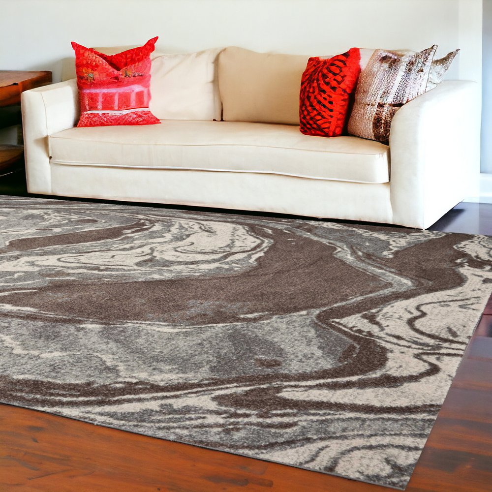 5' X 8' Brown And Ivory Abstract Area Rug